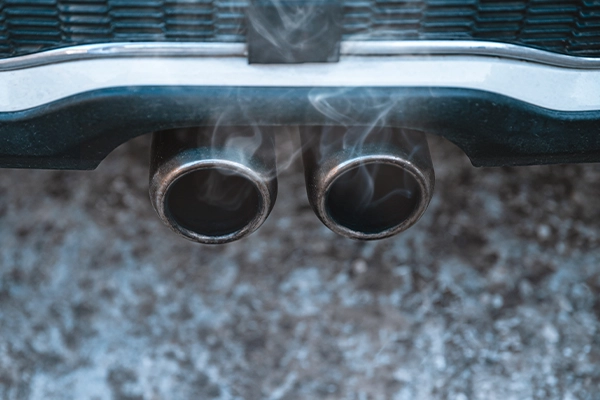 White smoke coming from dual exhaust pipes